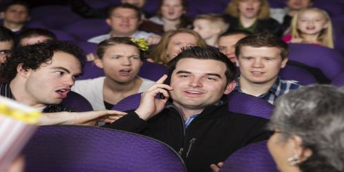 On the Phone in a Movie Theater